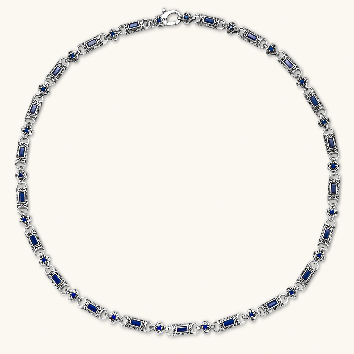 Oxidized silver 316L stainless steel chain necklace with rectangular navy CZ links and ornate gothic connector pieces, 640mm.